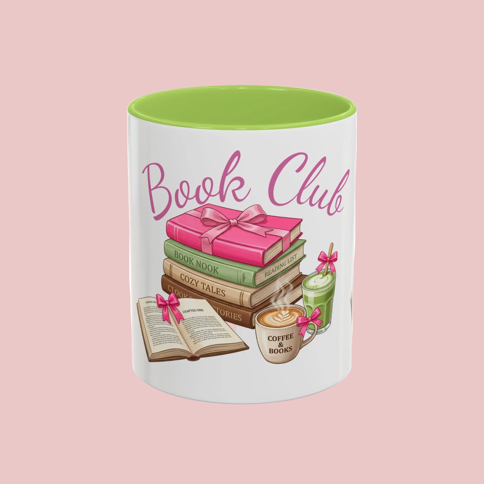 A white ceramic mug with a bright green interior, featuring a 'Book Club' graphic with a stack of pink and green books, an open book, a coffee cup, and a green jar on a white background.