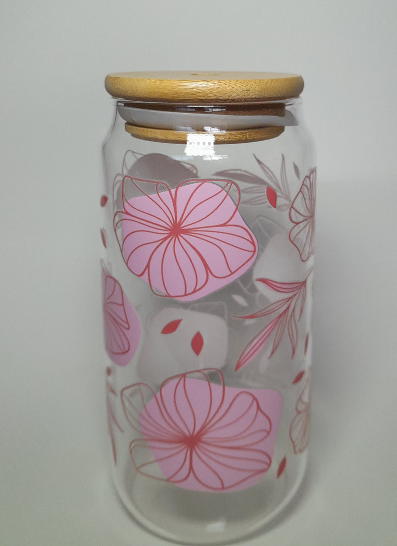 A Borosilicate Glass Cup With Bamboo Lid and Blossom Design