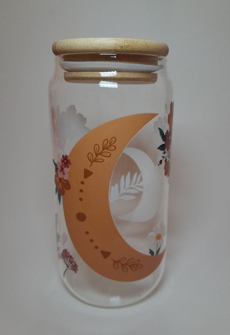 A Borosilicate Glass Cup with Moon Shape Design on it