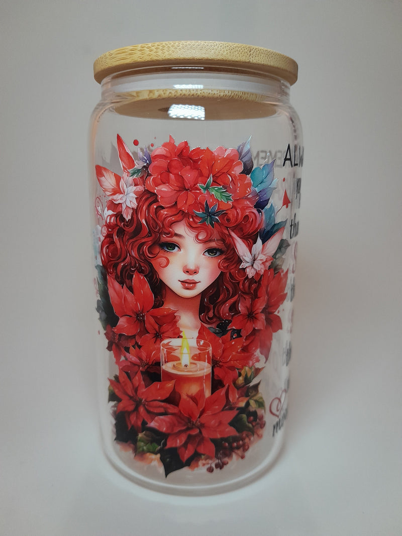 A borosilicate glass cup with bamboo lid and a quote design on it with lady face