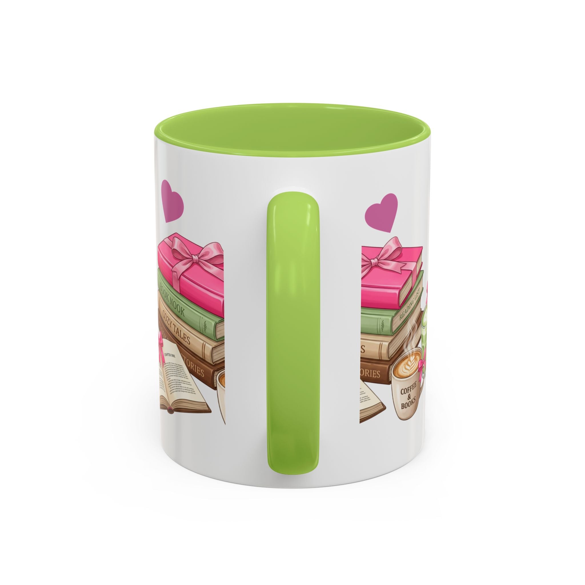 A white ceramic mug with a bright green handle and interior, featuring a printed design of stacked books, pink gift boxes, hearts, and a small coffee cup on the side.
