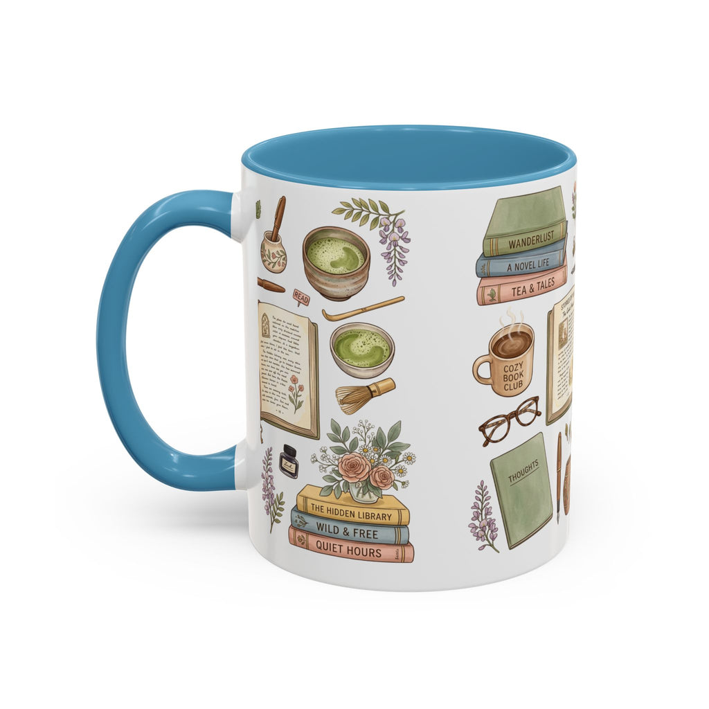 A white ceramic mug with a bright blue handle and interior, decorated with illustrated bookish and cozy motifs including books, eyeglasses, a cup of tea, flowers, and small drawings on a white background.