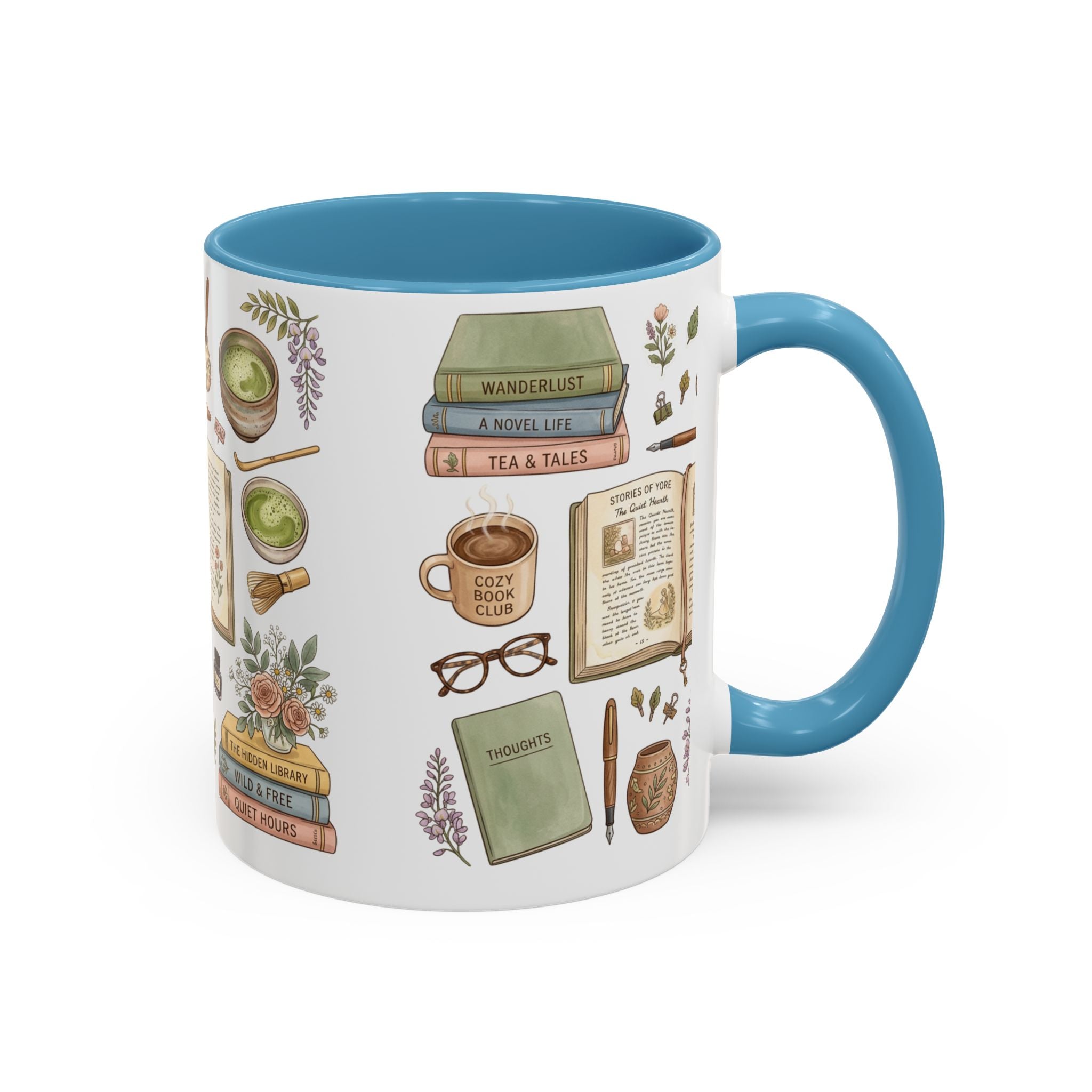 A white ceramic mug with a bright blue interior and handle, decorated with vintage-style illustrations of books, tea cups, glasses, flowers, and notebooks. The mug is shown on a clean white background.