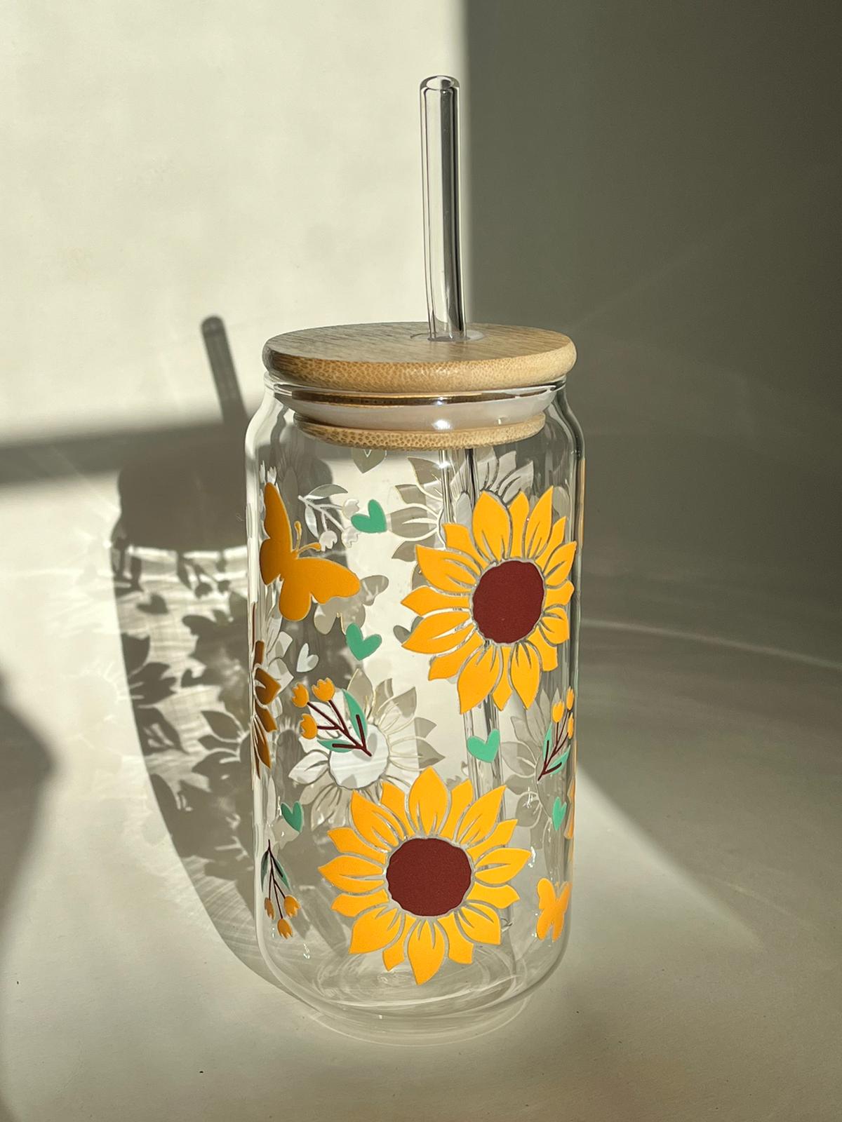 Lovely Blossoms 16oz borosilicate glass cup with sunflower and heart print, bamboo lid, and clear glass straw.