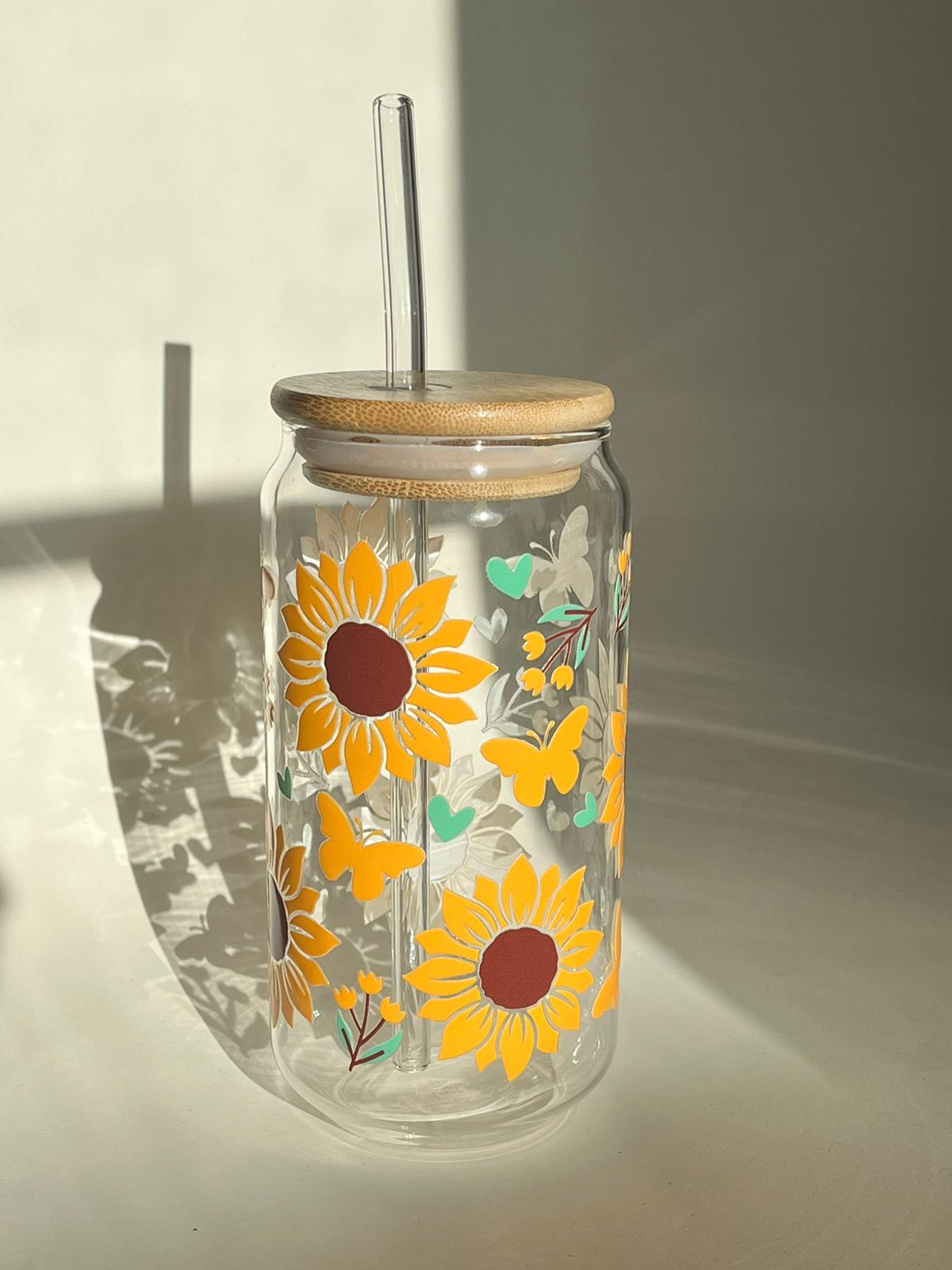 Lovely Blossoms 16oz borosilicate glass cup with sunflower and heart print, bamboo lid, and clear glass straw.