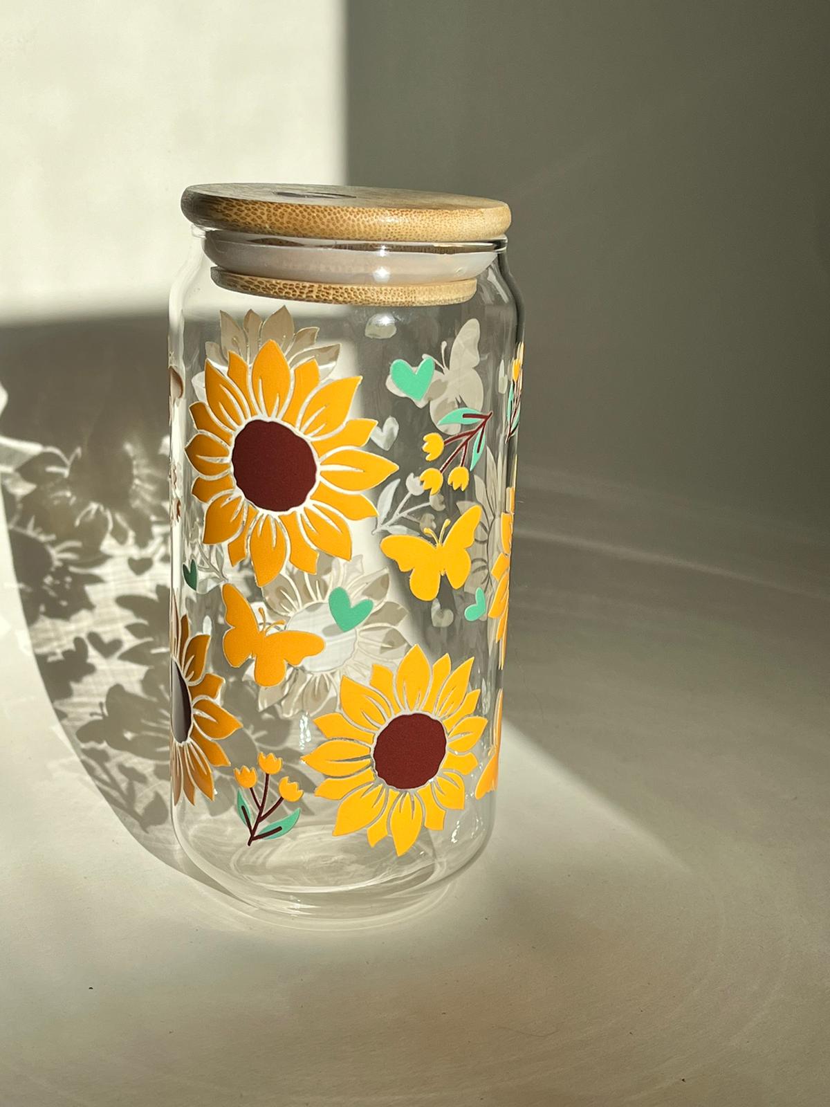 Lovely Blossoms 16oz borosilicate glass cup with sunflower and heart print, bamboo lid, and glass straw.